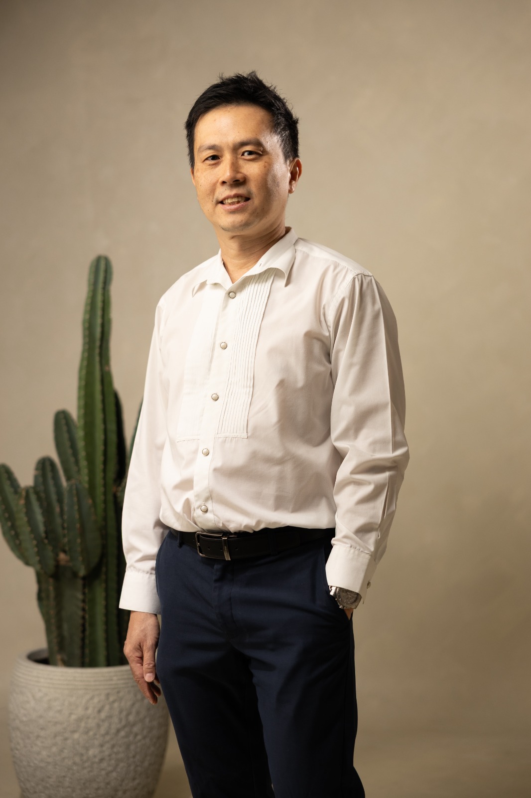 Raymond Ya, Singapore property adviser, standing portrait